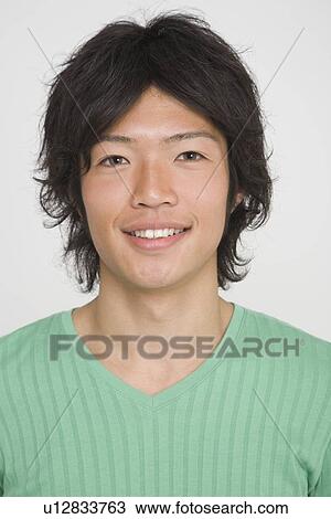 Stock Image - Portrait of a young man. Fotosearch
