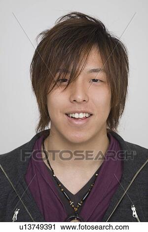Stock Image - Portrait of a young man. Fotosearch