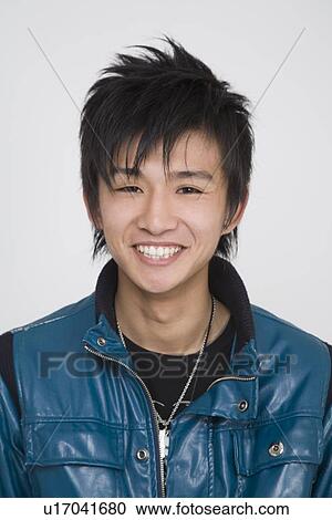 Stock Image - Portrait of a young man. Fotosearch