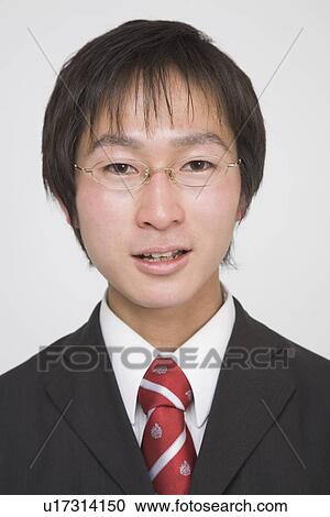 Portrait of a young man View Large Photo Image Stock Image - Portrait of a young man. Fotosearch
