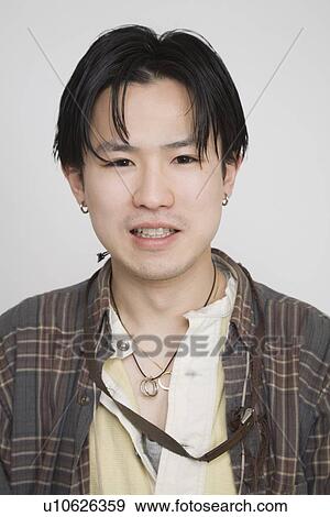 Stock Photo - Portrait of a young man. Fotosearch