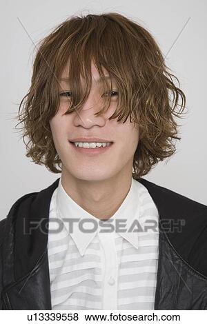 Portrait of a young man View Large Photo Image Stock Photo - Portrait of a young man. Fotosearch