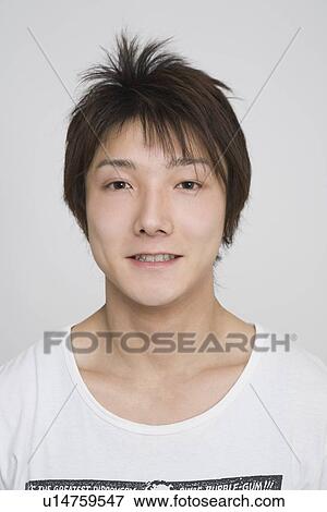 Portrait of a young man View Large Photo Image Stock Photo - Portrait of a young man. Fotosearch