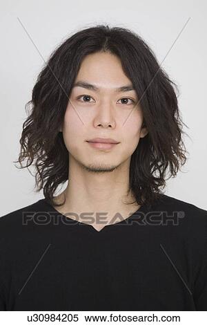 Stock Photography - Portrait of a young man. Fotosearch