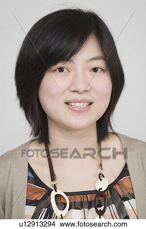 Portrait of a young woman View Large Photo Image Picture - Portrait of a young woman. Fotosearch