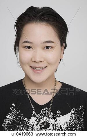 Portrait of a young woman View Large Photo Image Stock Image - Portrait of a young woman. Fotosearch