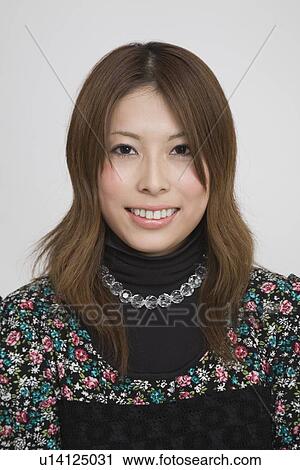 Portrait of a young woman View Large Photo Image Stock Image - Portrait of a young woman. Fotosearch