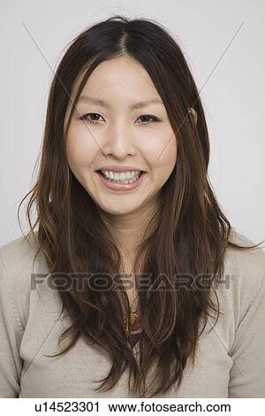 Portrait of a young woman View Large Photo Image Stock Image - Portrait of a young woman. Fotosearch