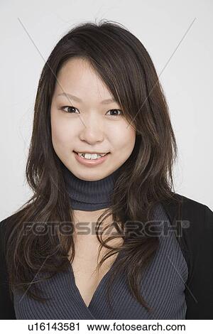 Portrait of a young woman View Large Photo Image Stock Image - Portrait of a young woman. Fotosearch