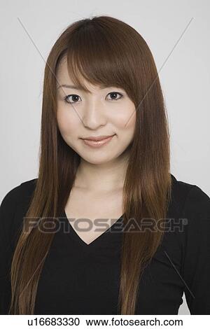 Stock Image - Portrait of a young woman. Fotosearch