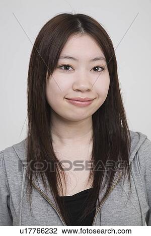 Portrait of a young woman View Large Photo Image Stock Image - Portrait of a young woman. Fotosearch