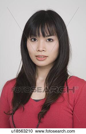 Stock Image - Portrait of a young woman. Fotosearch