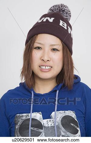 Stock Image - Portrait of a young woman. Fotosearch