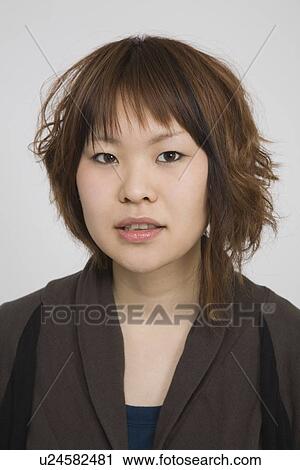 Stock Image - Portrait of a young woman. Fotosearch