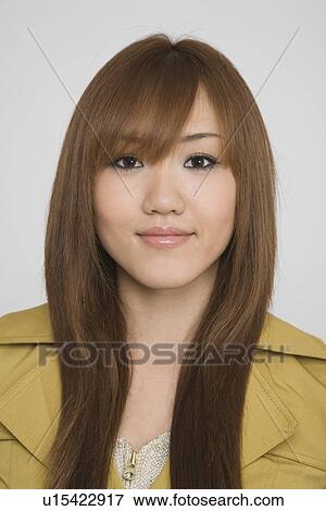 Stock Photo - Portrait of a young woman. Fotosearch