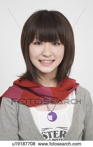 Stock Photo - Portrait of a young woman. Fotosearch