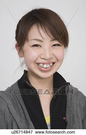 Portrait of a young woman View Large Photo Image Stock Photo - Portrait of a young woman. Fotosearch