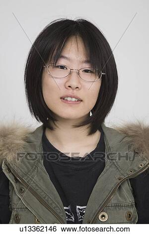 Portrait of a young woman View Large Photo Image Stock Photograph - Portrait of a young woman. Fotosearch