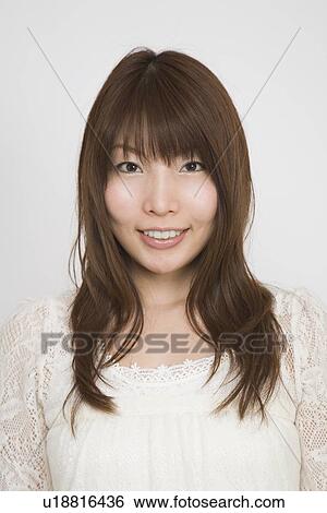 Portrait of a young woman View Large Photo Image Stock Photograph - Portrait of a young woman. Fotosearch