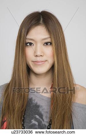 Portrait of a young woman View Large Photo Image Stock Photograph - Portrait of a young woman. Fotosearch
