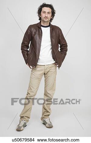 Portrait of a mid adult man standing View Large Photo Image Picture - Portrait of a mid adult man standing. Fotosearch
