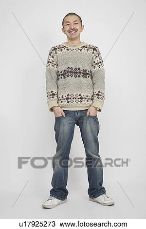 Portrait of a mid adult man standing View Large Photo Image Stock Image - Portrait of a mid adult man standing. Fotosearch
