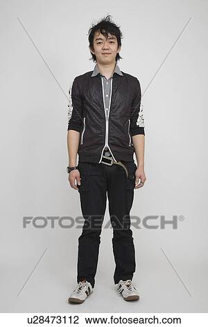Portrait of a mid adult man standing View Large Photo Image Stock Image - Portrait of a mid adult man standing. Fotosearch