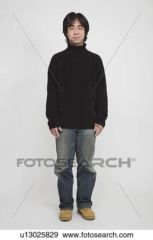 Portrait of a mid adult man standing View Large Photo Image Stock Photo - Portrait of a mid adult man standing. Fotosearch