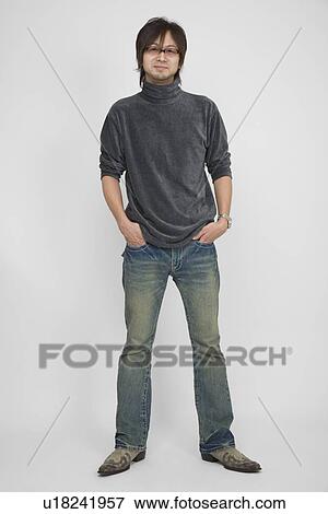 Portrait of a mid adult man standing View Large Photo Image Stock Photo - Portrait of a mid adult man standing. Fotosearch
