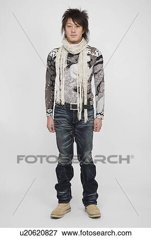 Portrait of a mid adult man standing View Large Photo Image Stock Photo - Portrait of a mid adult man standing. Fotosearch