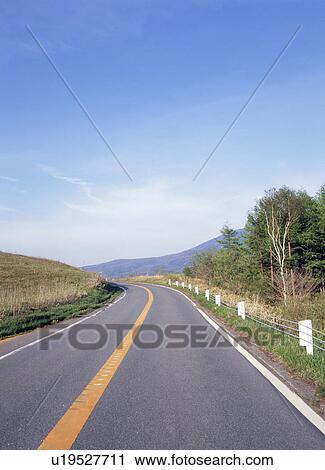 Left curve road through mountain View Large Photo Image Stock Image - Left curve road through mountain. Fotosearch
