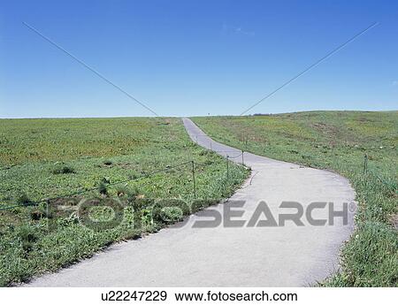 Stock Photo - Path and blue sky. Fotosearch