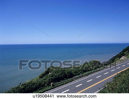 Stock Image - Road and sea. Fotosearch