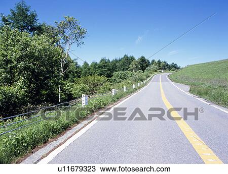 Road through mountain View Large Photo Image Stock Image - Road through mountain. Fotosearch