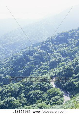 Road through mountain View Large Photo Image Stock Image - Road through mountain. Fotosearch