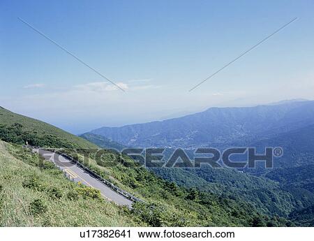 Road through mountain View Large Photo Image Stock Image - Road through mountain. Fotosearch
