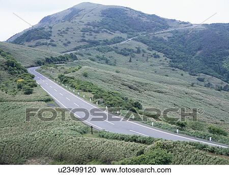 Road through mountain View Large Photo Image Stock Image - Road through mountain. Fotosearch