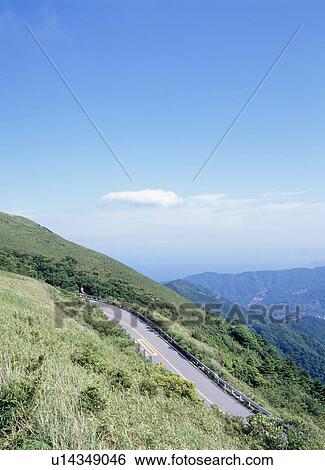 Stock Photograph - Road through mountain. Fotosearch