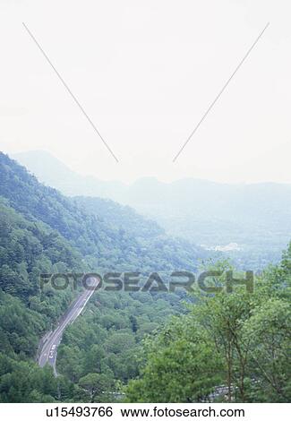 Road through mountain View Large Photo Image Stock Photograph - Road through mountain. Fotosearch