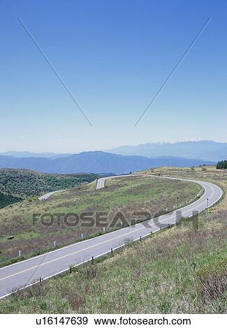 Winding road through mountain View Large Photo Image Stock Photo - Winding road through mountain. Fotosearch