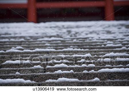 Close up of snow on stairs at shrine View Large Photo Image Stock Photo - Close up of snow on stairs at shrine. Fotosearch