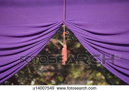 Stock Photo - Detail of shrine shroud with tassel. Fotosearch