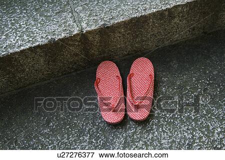 Stock Photo - Red traditional footwear. Fotosearch