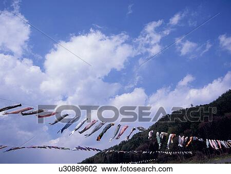 Stock Image - Altocumulus and cirocumulus clouds. Fotosearch