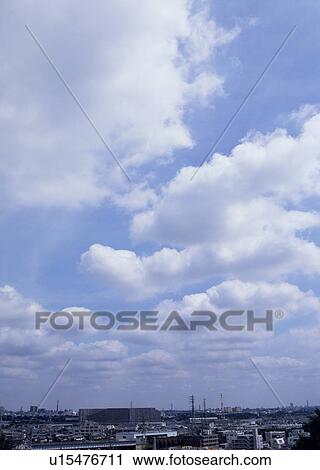 Stock Image - Humilis and cirocumulus clouds. Fotosearch