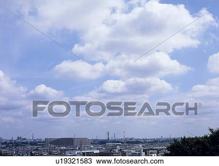 Stock Image - Humilis and cirocumulus clouds. Fotosearch