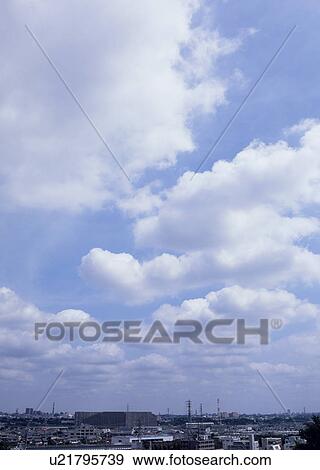 Stock Photo - Humilis and cirocumulus clouds. Fotosearch