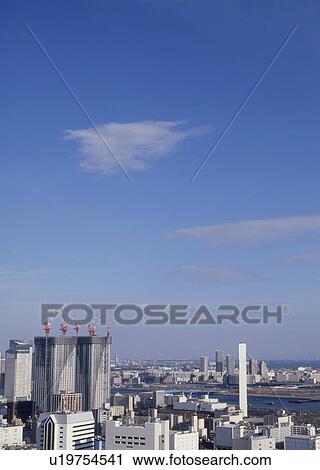 Stock Image - Humilis and cirrostratus clouds. Fotosearch