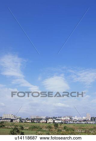 Stock Photo - Humilis and stratocumulus clouds. Fotosearch