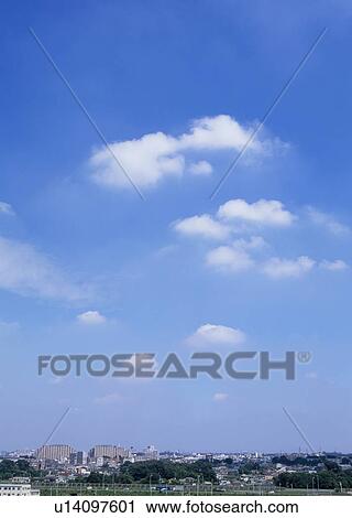 Stock Image - Humilis and stratus clouds. Fotosearch